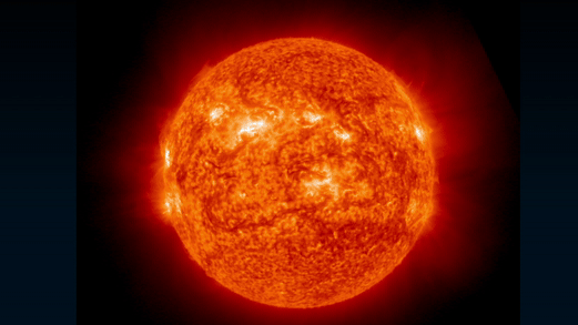 gif animation showing a large solar flare eruption off the sun's upper left region
