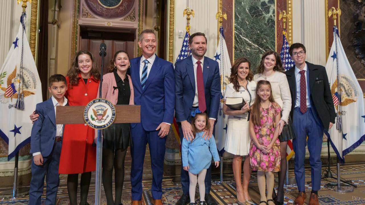 U.S. Transportation Secretary Sean Duffy (center left, in blue suit and striped tie) and family at his ceremonial swearing-in by Vice President J.D. Vance in January 2025.