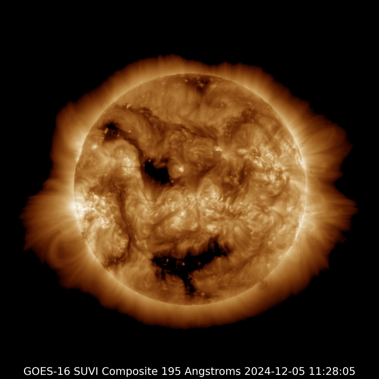 large Earth facing coronal holes visible in this satellite image could bring enhanced solar wind, triggering auroras on Dec. 6 through Dec. 7.