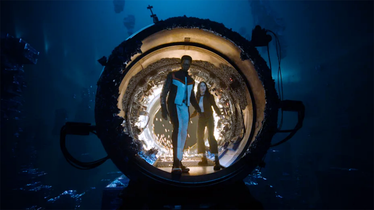 Mr Terrific and Lois Lane emerging into the pocket universe in Superman (2025).